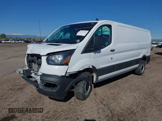 2023 Ford Transit Cargo with VIN 1FTYE1Y82PKA84762, listed as a IAAI auction lot 41718720 with 21,029 mi miles and . Bid and sale history available at DreamBid. Image 17.