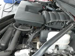 2014 Chevrolet Silverado 1500 LT z VIN 1GCRCREH4EZ251155, wystawiony jako IAAI lot #42882373 z przebiegiem 211 225 mil mil oraz . Historia ofert i sprzedaży dostępna na DreamBid. Obrazek 22.