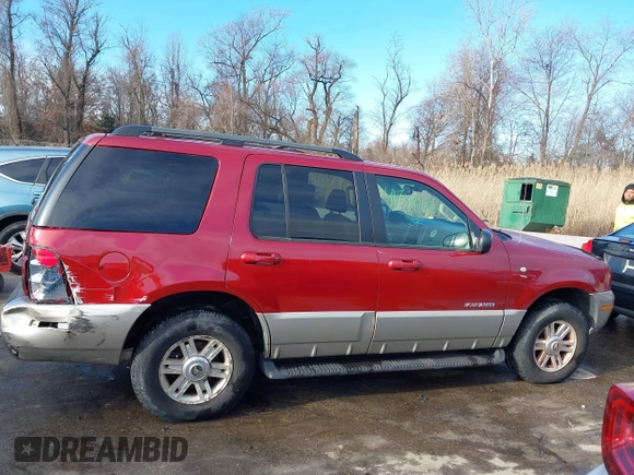 2002 Mercury Mountaineer Convenience z VIN 4M2ZU86W12ZJ16791, wystawiony jako IAAI lot #41749193 z przebiegiem 167 878 mil mil oraz . Historia ofert i sprzedaży dostępna na DreamBid. Obrazek 13.