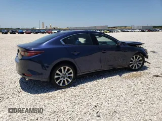 2020 Mazda 3 Premium with VIN JM1BPAEM0L1165843, listed as a Copart auction lot 57572933 with Not provided miles and . Bid and sale history available at DreamBid. Image 3.