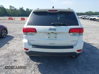 2020 Jeep Grand Cherokee Laredo E with VIN 1C4RJFAG1LC389026, listed as a IAAI auction lot 42261396 with 100,409 mi miles and . Bid and sale history available at DreamBid. Image 16.