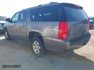 2013 GMC Yukon XL SLT with VIN 1GKS2KE70DR303872, listed as a IAAI auction lot 41659911 with 199,202 mi miles. Bid and sale history available at carsss.com. Image 3.