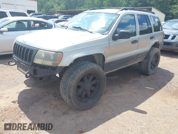 2004 Jeep Grand Cherokee Laredo with VIN 1J4GW48S34C354006, listed as a IAAI auction lot 42599812 with 258,004 mi miles and . Bid and sale history available at DreamBid. Image 2.
