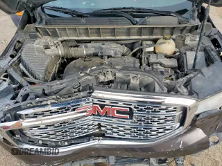 2018 GMC Acadia SLT with VIN 1GKKNMLAXJZ211715, listed as a Copart auction lot 61094385 with 106,929 mi miles and Salvage title. Bid and sale history available at DreamBid. Image 11.