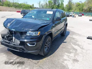 2020 Jeep Grand Cherokee Laredo with VIN 1C4RJFAG8LC234005, listed as a IAAI auction lot 42103558 with 101,684 mi miles and . Bid and sale history available at DreamBid. Image 2.