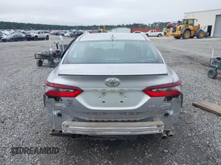 2023 Toyota Camry SE z VIN 4T1G11AK4PU724404, wystawiony jako IAAI lot #41925212 z przebiegiem 53 225 mil mil oraz . Historia ofert i sprzedaży dostępna na DreamBid. Obrazek 17.