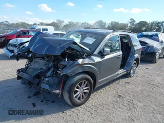 2013 Dodge Journey SXT with VIN 3C4PDCBG6DT552707, listed as a IAAI auction lot 40978636 with Not Provided miles. Bid and sale history available at carsss.com. Image 2.