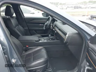 2023 Mazda CX-50 S Premium Plus z VIN 7MMVABEM6PN105424, wystawiony jako IAAI lot #42148825 z przebiegiem 40 434 mil mil oraz . Historia ofert i sprzedaży dostępna na DreamBid. Obrazek 5.