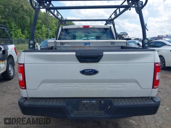 2018 Ford F-150 XL with VIN 1FTEX1CB5JFE55932, listed as a IAAI auction lot 42298917 with 143,923 mi miles and . Bid and sale history available at DreamBid. Image 16.
