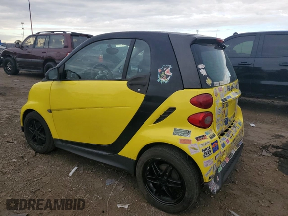 2013 Smart fortwo Pure z VIN WMEEJ3BA2DK663432, wystawiony jako Copart lot #63203755 z przebiegiem 79 786 mil mil oraz Czysty tytuł • Clean title. Historia ofert i sprzedaży dostępna na DreamBid. Obrazek 2.