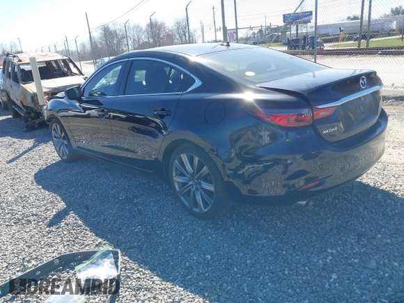 2019 Mazda 6 Grand Touring with VIN JM1GL1TY7K1501946, listed as a IAAI auction lot 41786545 with 118,800 mi miles and . Bid and sale history available at carsss.com. Image 3.