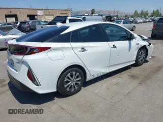 2021 Toyota Prius LE z VIN JTDKAMFP3M3187644, wystawiony jako IAAI lot #42443171 z przebiegiem 126 977 mil mil oraz . Historia ofert i sprzedaży dostępna na DreamBid. Obrazek 4.
