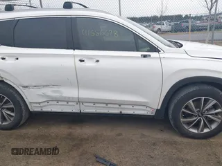 2020 Hyundai Santa Fe Limited with VIN 5NMS5CAD8LH286830, listed as a IAAI auction lot 41586628 with 80,381 mi miles and . Bid and sale history available at DreamBid. Image 18.