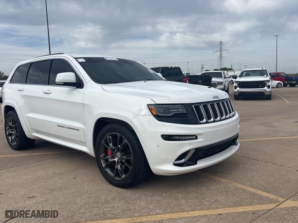 2015 Jeep Grand Cherokee SRT with VIN 1C4RJFDJ3FC896473, listed as a Copart auction lot 53915385 with 124,091 mi miles and Clean Title. Bid and sale history available at carsss.com. Image 1.