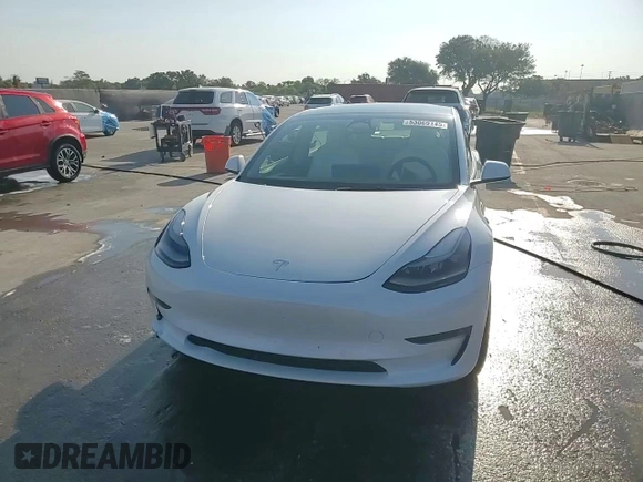 2022 Tesla Model 3 Long Range with VIN 5YJ3E1EB2NF199141, listed as a Copart auction lot 53069145 with 67,140 mi miles and Non Repairable. Bid and sale history available at DreamBid. Image 13.