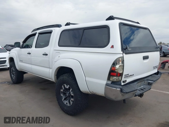 2009 Toyota Tacoma PreRunner with VIN 3TMJU62N49M076433, listed as a IAAI auction lot 41902369 with 164,827 mi miles. Bid and sale history available at carsss.com. Image 3.