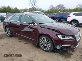 2017 Lincoln MKZ Select z VIN 3LN6L5CC3HR620854, wystawiony jako IAAI lot #41042376 z przebiegiem 131 517 mil mil oraz . Historia ofert i sprzedaży dostępna na DreamBid. Obrazek 6.