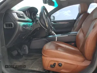 2016 Maserati Ghibli z VIN ZAM57XSAXG1174741, wystawiony jako Copart lot #51975655 z przebiegiem 127 182 mil mil oraz Tytuł czysty. Historia ofert i sprzedaży dostępna na DreamBid. Obrazek 7.