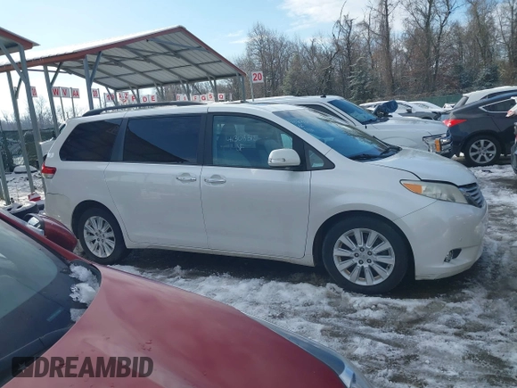 2013 Toyota Sienna XLE AAS with VIN 5TDYK3DC9DS380445, listed as a IAAI auction lot 41308312 with 174,325 mi miles and . Bid and sale history available at DreamBid. Image 13.