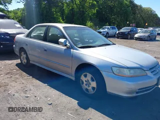 2002 Honda Accord EX z VIN 1HGCG16522A021464, wystawiony jako IAAI lot #42283016 z przebiegiem 128 431 mil mil oraz . Historia ofert i sprzedaży dostępna na DreamBid. Obrazek 1.