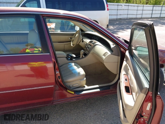 2001 Toyota Avalon XL z VIN 4T1BF28B41U178086, wystawiony jako IAAI lot #42253446 z przebiegiem 249 390 mil mil oraz . Historia ofert i sprzedaży dostępna na DreamBid. Obrazek 5.