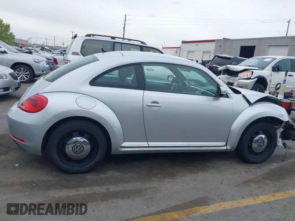 2013 Volkswagen Beetle with VIN 3VWHX7ATXDM658134, listed as a IAAI auction lot 42097779 with 47,901 mi miles and . Bid and sale history available at DreamBid. Image 14.