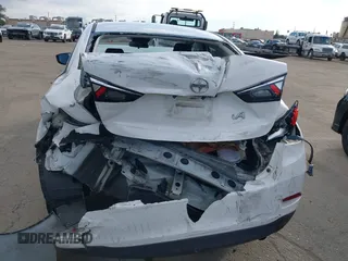 2016 Scion iA z VIN 3MYDLBZV9GY139080, wystawiony jako IAAI lot #41494384 z przebiegiem 106 092 mil mil oraz . Historia ofert i sprzedaży dostępna na DreamBid. Obrazek 16.