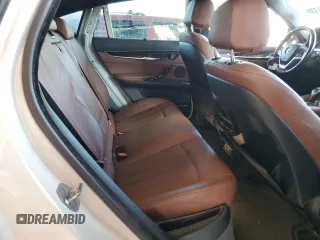 2017 BMW X6 xDrive35i z VIN 5UXKU2C3XH0U28490, wystawiony jako Copart lot #55751435 z przebiegiem 190 919 mil mil oraz Szkoda całkowita • Salvage title. Historia ofert i sprzedaży dostępna na DreamBid. Obrazek 11.