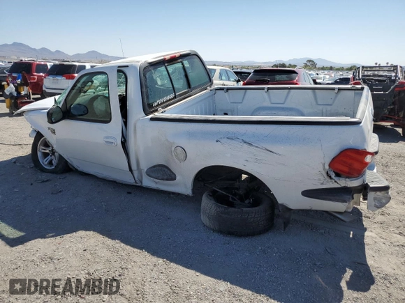 2002 Ford F-150 XL with VIN 1FTRF07L62KD27855, listed as a Copart auction lot 60939935 with Not provided miles and Salvage title. Bid and sale history available at DreamBid. Image 2.