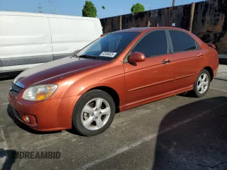 2009 Kia Spectra EX with VIN KNAFE222995027376, listed as a Copart auction lot 52406025 with 73,692 mi miles and Salvage Title. Bid and sale history available at DreamBid. Image 1.