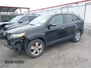 2012 Kia Sorento EX with VIN 5XYKU4A22CG251847, listed as a IAAI auction lot 42014433 with 166,186 mi miles. Bid and sale history available at carsss.com. Image 2.