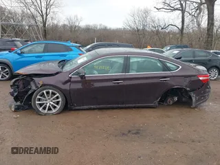 2014 Toyota Avalon Limited z VIN 4T1BK1EB4EU128658, wystawiony jako IAAI lot #41722882 z przebiegiem 53 420 mil mil oraz . Historia ofert i sprzedaży dostępna na DreamBid. Obrazek 15.