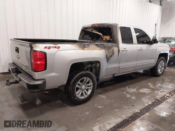 2019 Chevrolet Silverado 1500 LT with VIN 2GCVKPEC2K1105528, listed as a IAAI auction lot 41718796 with 95,999 mi miles and . Bid and sale history available at DreamBid. Image 4.