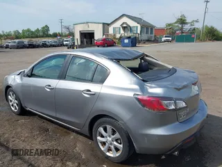 2011 Mazda Mazda3 i Touring with VIN JM1BL1VGXB1372499, listed as a IAAI auction lot 42112283 with 98,564 mi miles. Bid and sale history available at carsss.com. Image 3.
