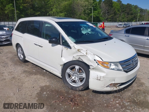 2013 Honda Odyssey Touring with VIN 5FNRL5H96DB009694, listed as a IAAI auction lot 42002487 with 182,867 mi miles and . Bid and sale history available at carsss.com. Image 1.