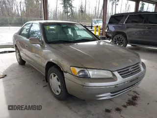 1997 Toyota Camry LE z VIN JT2BG22K3V0093238, wystawiony jako IAAI lot #41916196 z przebiegiem 218 511 mil mil oraz . Historia ofert i sprzedaży dostępna na DreamBid. Obrazek 1.