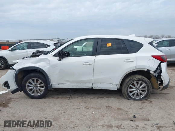 2016 Mazda CX-5 Touring with VIN JM3KE2CY1G0888850, listed as a IAAI auction lot 41562701 with 1 mi miles. Bid and sale history available at carsss.com. Image 14.