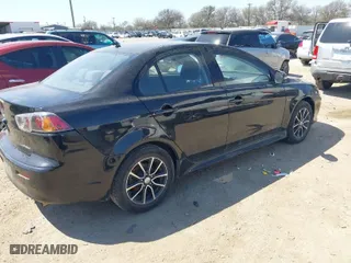 2017 Mitsubishi Lancer ES with VIN JA32U2FU1HU008159, listed as a IAAI auction lot 41782063 with 105,922 mi miles. Bid and sale history available at carsss.com. Image 4.