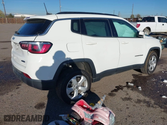 2019 Jeep Compass Latitude with VIN 3C4NJDBB5KT704564, listed as a IAAI auction lot 40768531 with 95,291 mi miles. Bid and sale history available at carsss.com. Image 4.