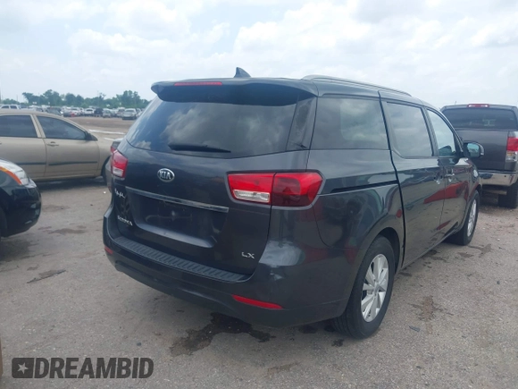2015 Kia Sedona LX with VIN KNDMB5C16F6065437, listed as a IAAI auction lot 42079430 with 149,991 mi miles and . Bid and sale history available at DreamBid. Image 4.