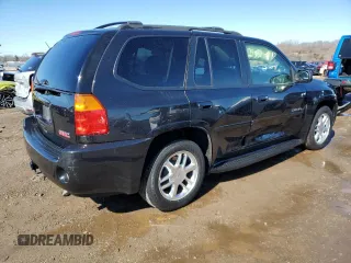 2008 GMC Envoy Denali with VIN 1GKET63M282161131, listed as a Copart auction lot 48054005 with 89,704 mi miles and Salvage Title. Bid and sale history available at carsss.com. Image 3.