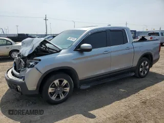 2019 Honda Ridgeline RTL with VIN 5FPYK3F5XKB024822, listed as a Copart auction lot 58831485 with Not provided miles and Salvage title. Bid and sale history available at DreamBid. Image 1.