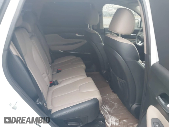 2020 Hyundai Santa Fe Limited with VIN 5NMS5CAD8LH286830, listed as a IAAI auction lot 41586628 with 80,381 mi miles and . Bid and sale history available at DreamBid. Image 8.