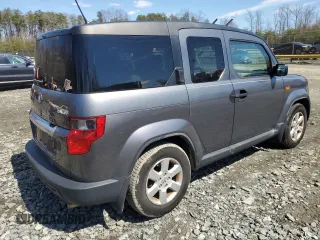 2010 Honda Element EX with VIN 5J6YH2H72AL005123, listed as a Copart auction lot 50206125 with 200,077 mi miles and Salvage Title. Bid and sale history available at DreamBid. Image 3.