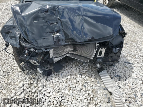 2023 Genesis G70 2.0T with VIN KMTG34TA2PU126768, listed as a Copart auction lot 56201094 with 11,556 mi miles and Salvage Title. Bid and sale history available at DreamBid. Image 11.