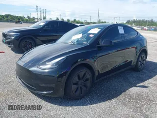 2024 Tesla Model Y z VIN 7SAYGDED6RF191135, wystawiony jako IAAI lot #41790922 z przebiegiem 17 154 mil mil oraz . Historia ofert i sprzedaży dostępna na DreamBid. Obrazek 17.