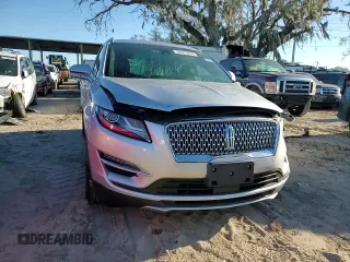 2019 Lincoln MKC Reserve with VIN 5LMCJ3D94KUL09107, listed as a Copart auction lot 82624854 with 27,502 mi miles and Salvage title. Bid and sale history available at DreamBid. Image 12.