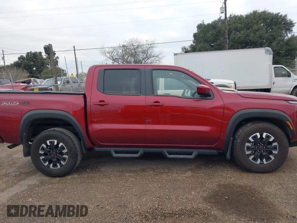 2023 Nissan Frontier Pro-4X z VIN 1N6ED1EK4PN652544, wystawiony jako IAAI lot #41309698 z przebiegiem 26 173 mil mil oraz . Historia ofert i sprzedaży dostępna na DreamBid. Obrazek 13.