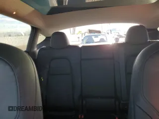 2024 Tesla Model Y Long Range с VIN 7SAYGDEE3RA236473, выставлен на аукционе Copart как лот 77409334 с пробегом 5 822 миль миль и Списание • Salvage title. История ставок и продаж доступна на DreamBid. Изображение 10.