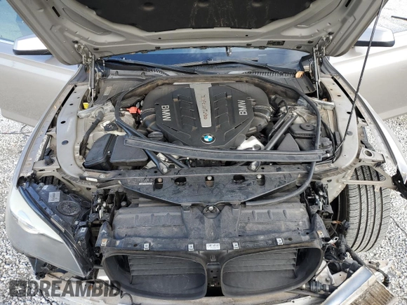 2012 BMW 7 Series 750Li с VIN WBAKB8C54CC965064, выставлен на аукционе Copart как лот 46308795 с пробегом 103 301 миль миль и Списание • Salvage title. История ставок и продаж доступна на DreamBid. Изображение 11.